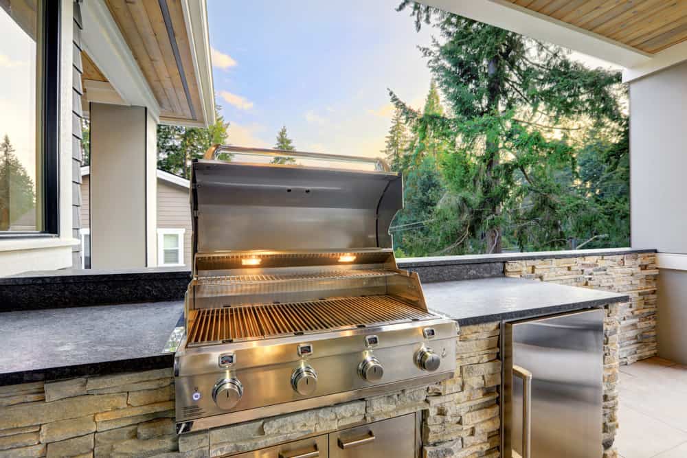 Outdoor kitchen with open grill